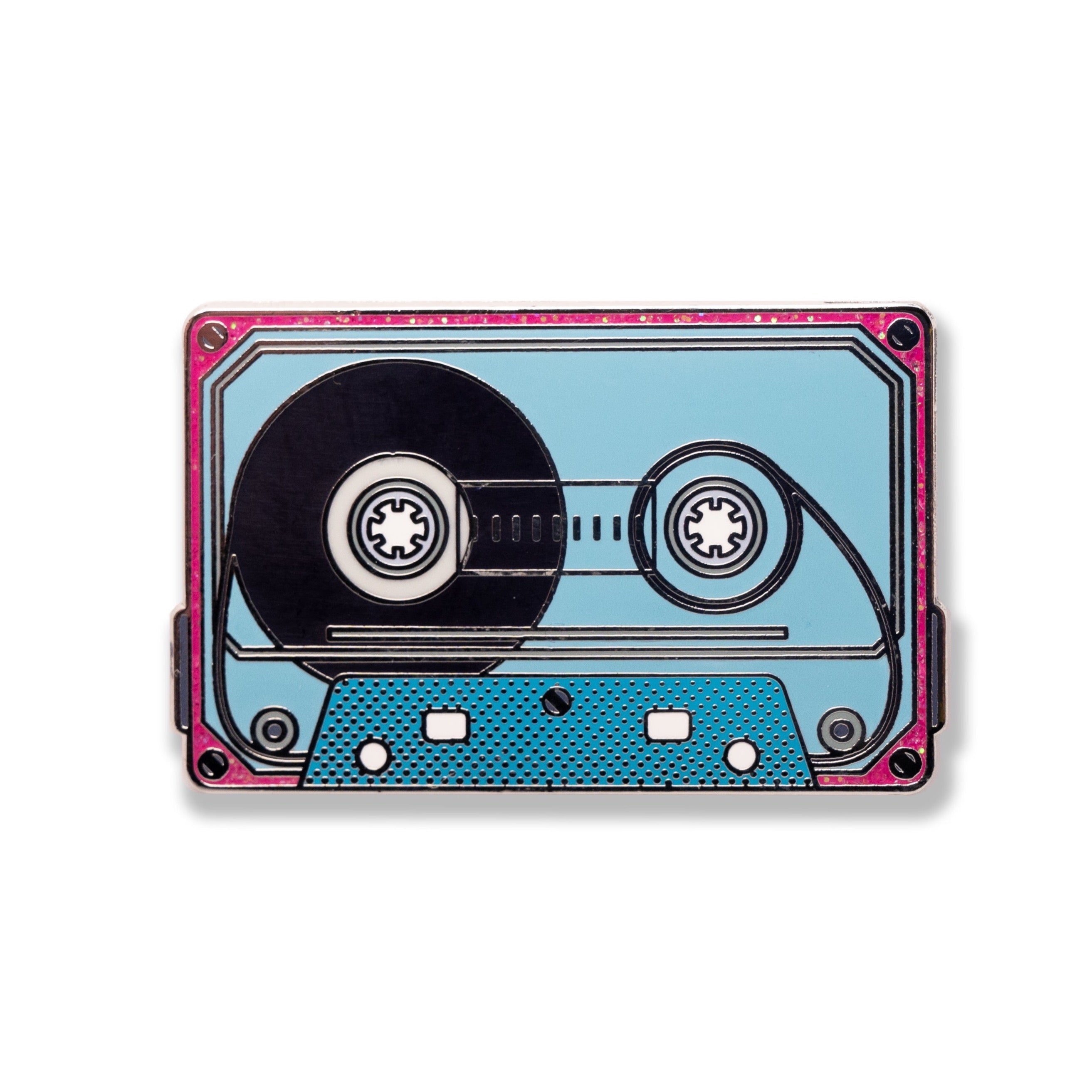 An enamel pin designed to resemble a retro cassette tape with a glitter inlay, predominantly in blue and pink colors.