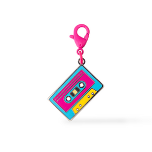 Colorful cassette tape keychain with a pink clip on a white background
