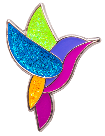 Colorful hummingbird-shaped pin with glittery wings on a white background