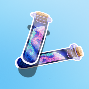 Two test tubes with colorful liquid on a blue background