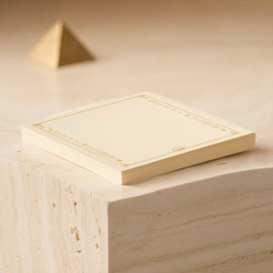 Close-up of the Egyptian Post-it pad and paper edges