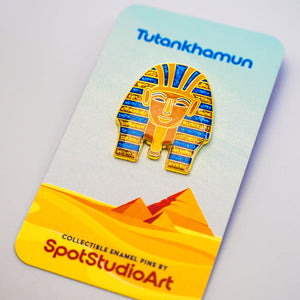 Collectible enamel pin of Tutankhamun on a branded card with 'SpotStudioArt' branding.