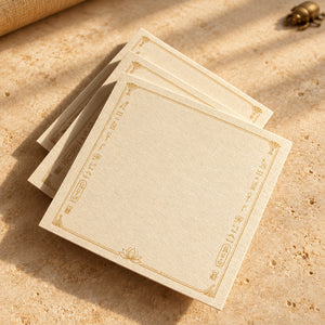 Close-up of three Egyptian 3 by 3 inch Post-it note pads with gold hieroglyph-inspired borders and lotus details