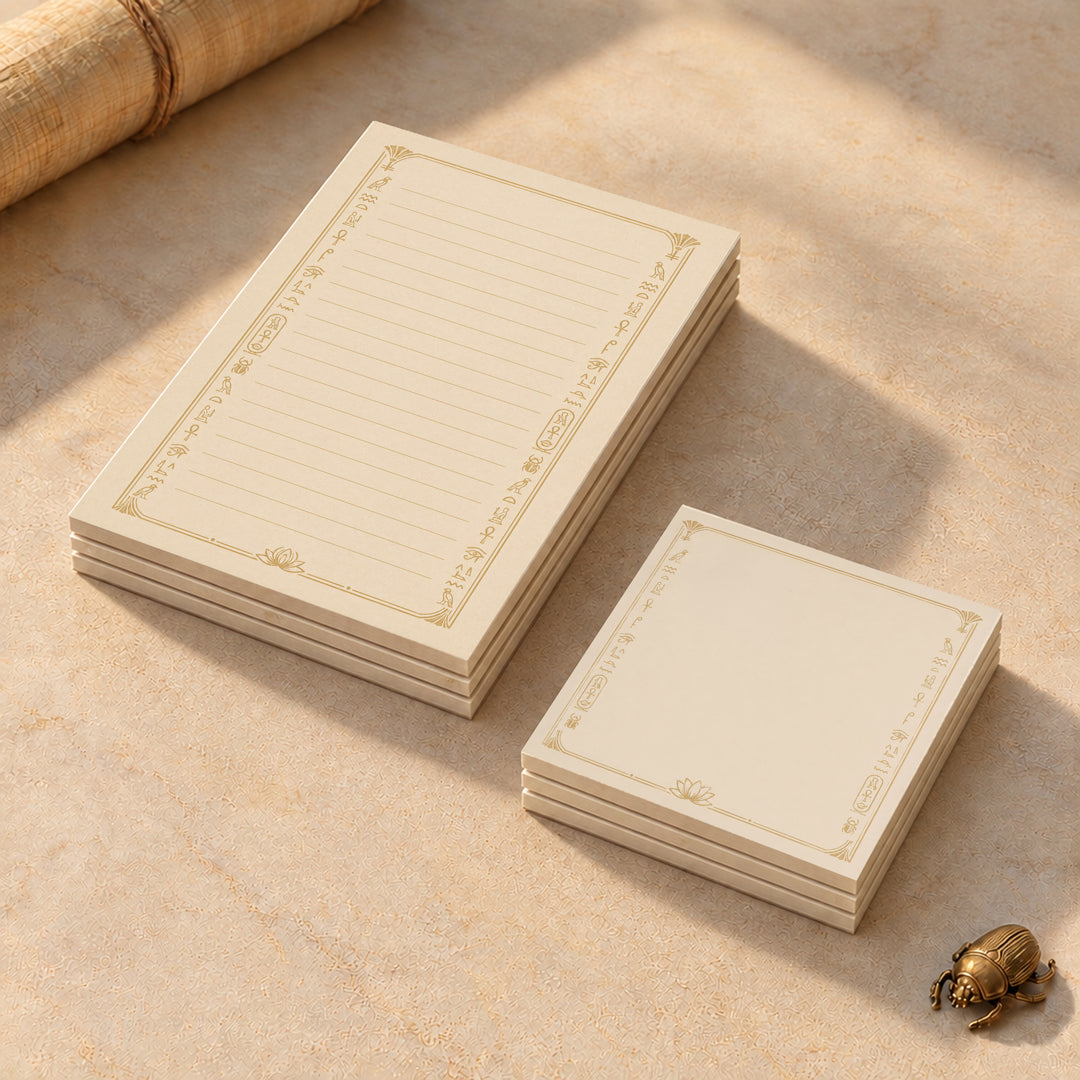 Egyptian stationery bundle with three lined 4 by 6 inch notepads and three 3 by 3 inch Post-it note pads, featuring gold hieroglyph-inspired borders and lotus motifs
