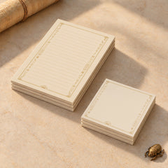 Egyptian stationery bundle with three lined 4 by 6 inch notepads and three 3 by 3 inch Post-it note pads, featuring gold hieroglyph-inspired borders and lotus motifs