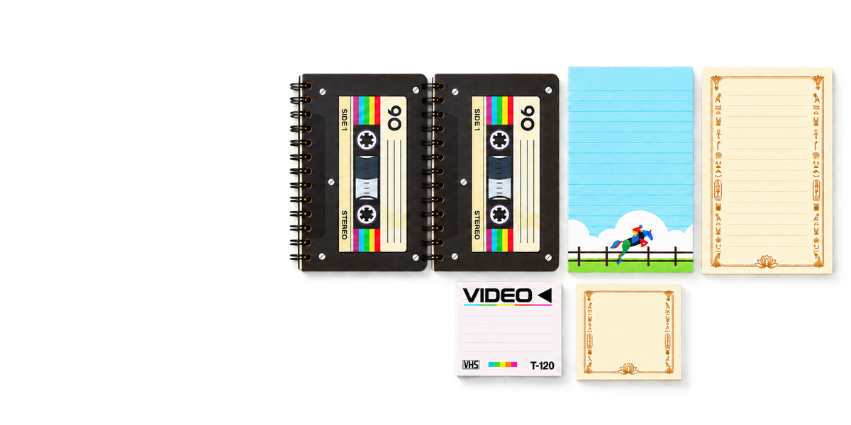 Spot Studio matching A6 cassette notebooks, equestrian and Egyptian notepads, and smaller VHS and Egyptian sticky-note pads
